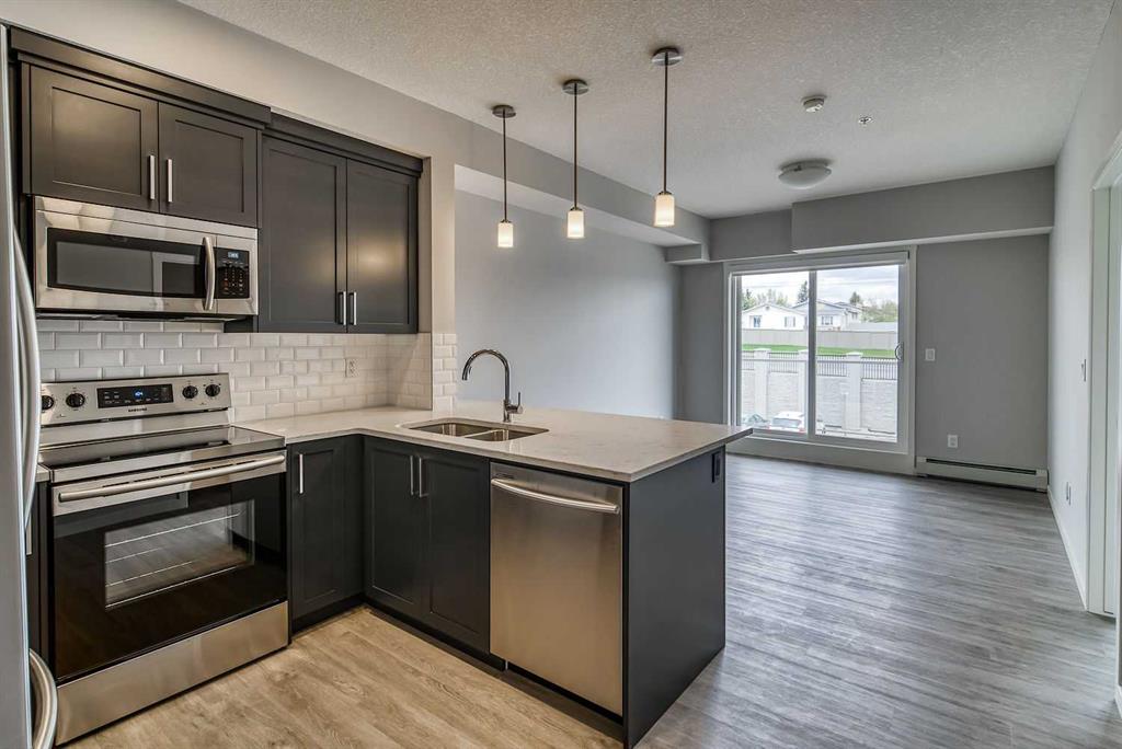 #215 300 Harvest Hills Place NE, Calgary, Alberta, T3K 2P4