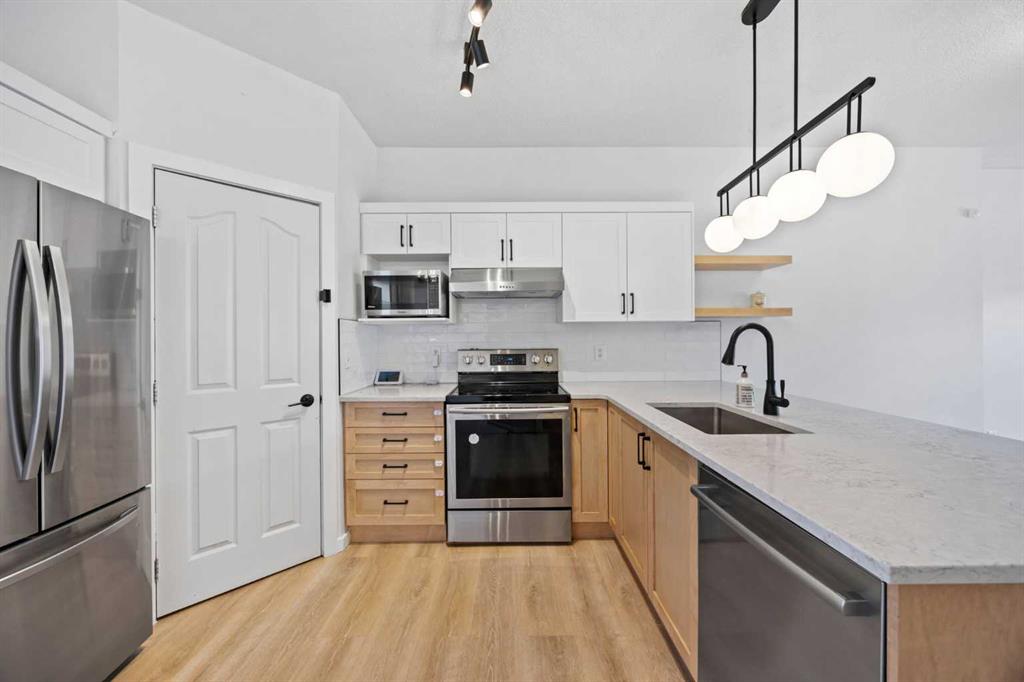 #201 2066 Luxstone Boulevard SW, Airdrie, Alberta, T4B 0L1